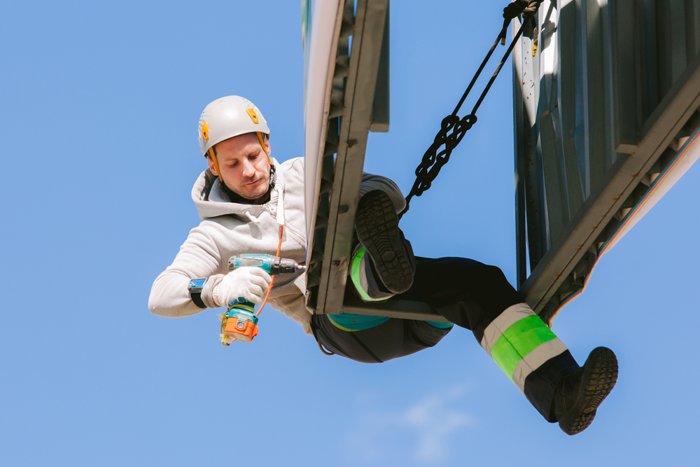 Industrial,Climber,In,Helmet,And,Overall,Working,On,Height.,Risky